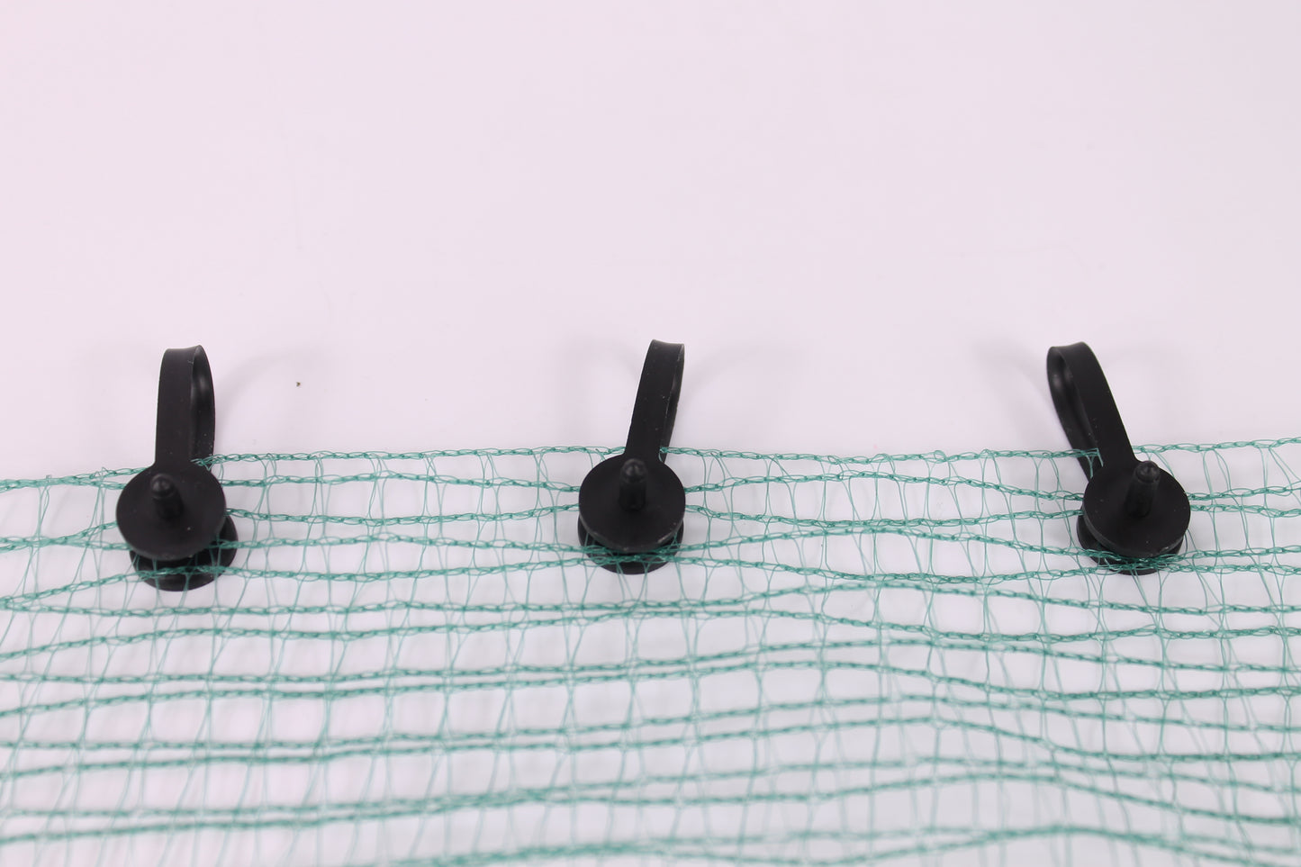 Multiple Black Barbed Landscape Fabric Pegs