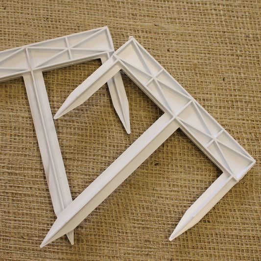 Tri-Pegs Being Used to Secure Garden Netting