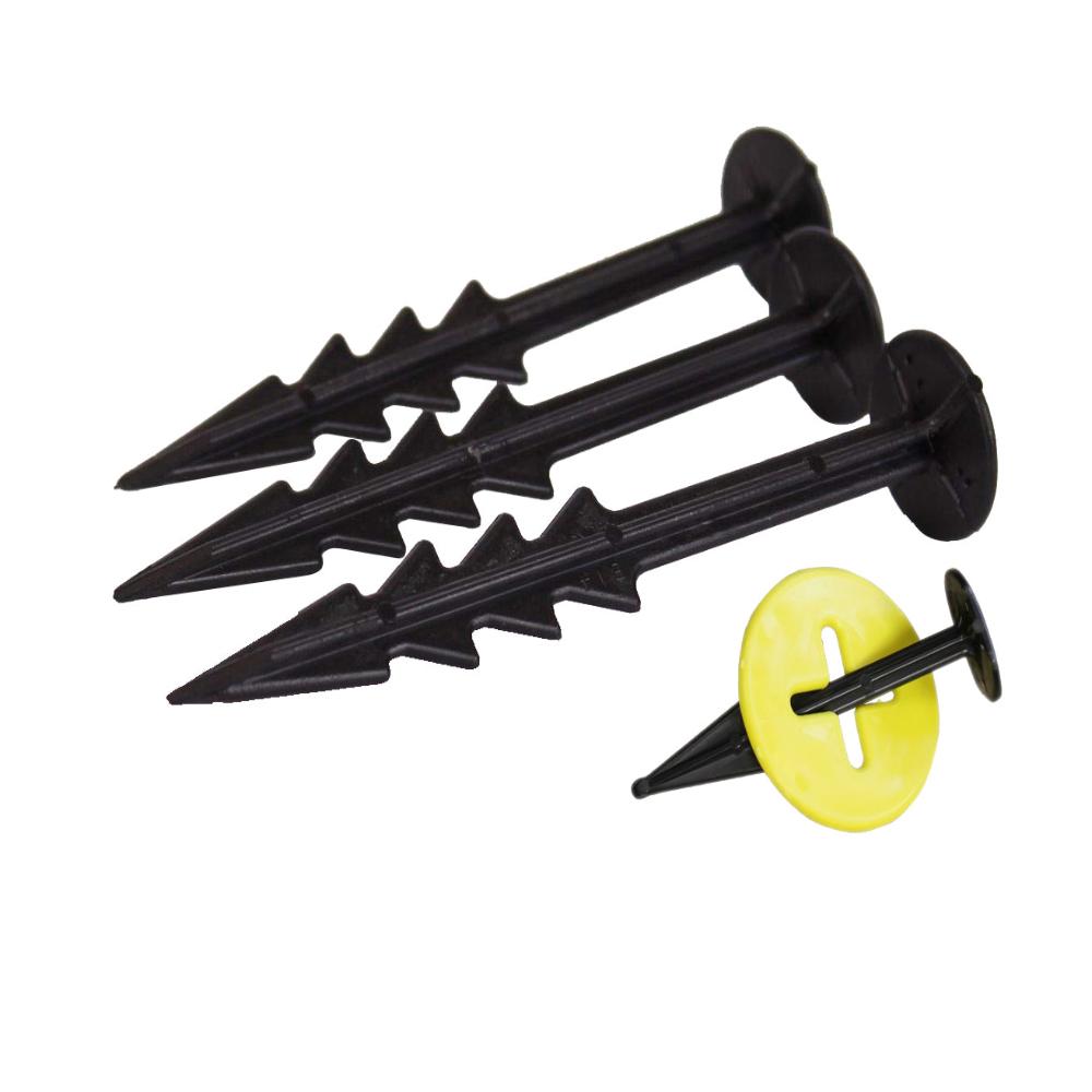 Close-Up of Black Barbed Garden Pegs