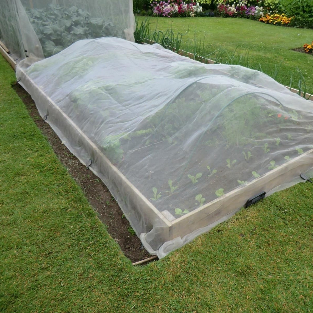 Crop Cover Clips Holding Garden Netting in Place