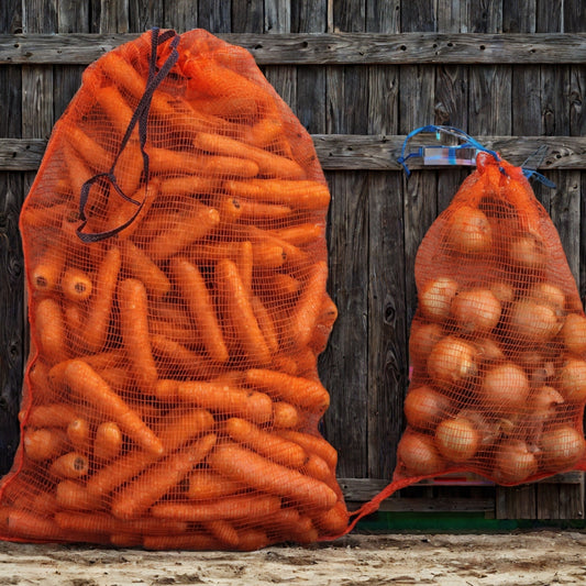 Vegetable Storage Sack Hung on Garden Fence